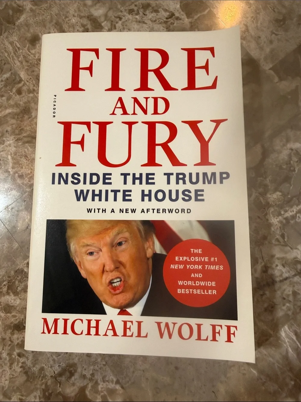 Fire and Fury by Michael Wolff - White Cover Paperback